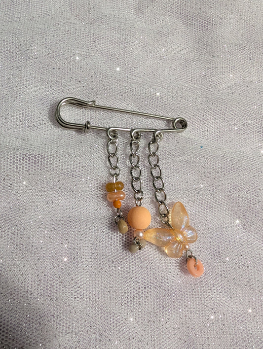 Broche Pixie