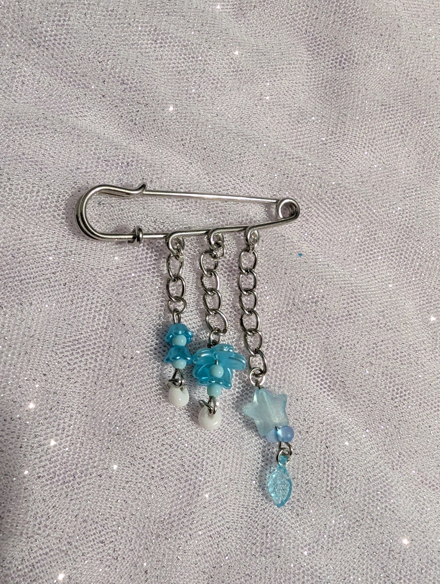 Broche Pixie