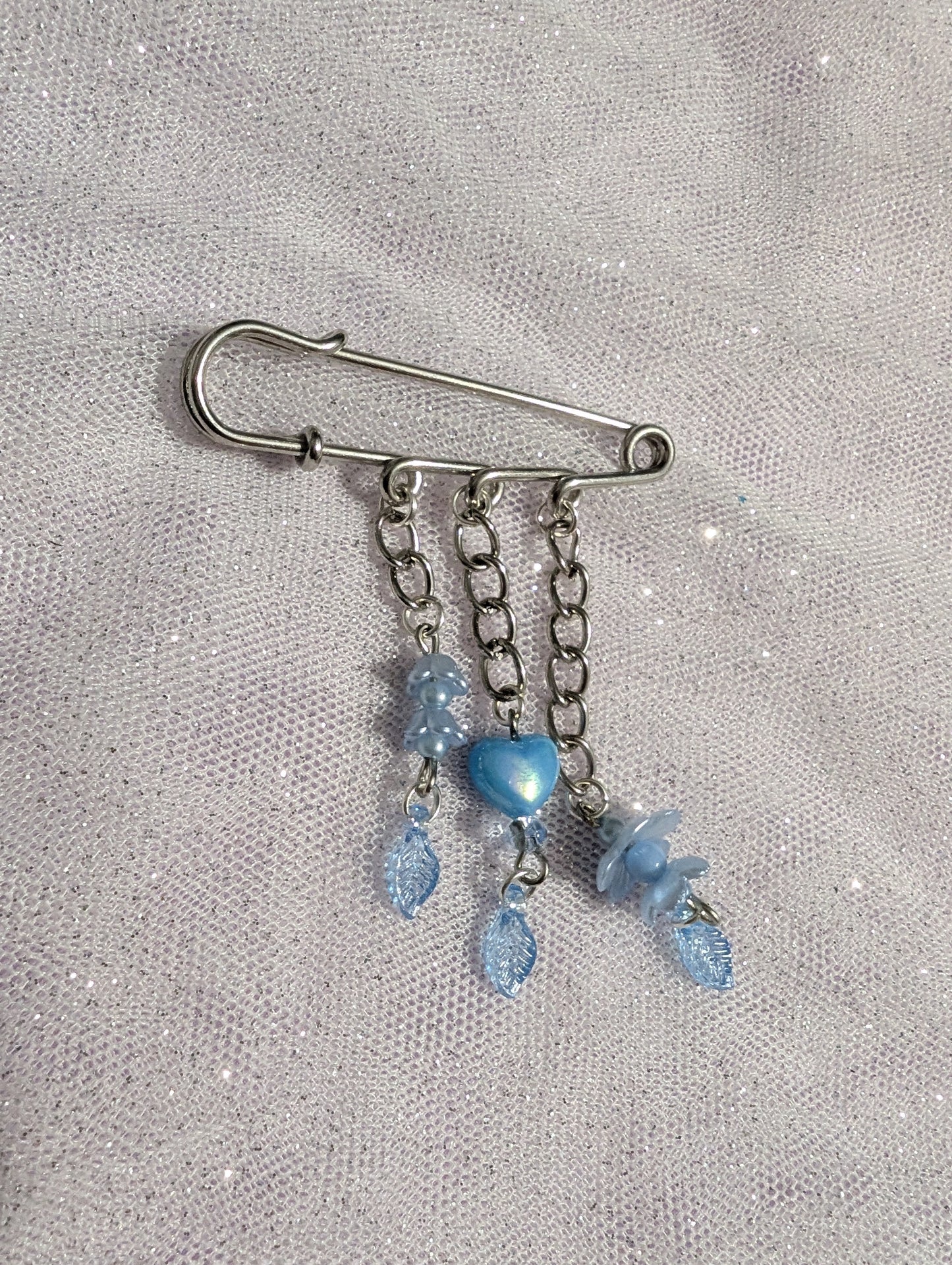 Broche Pixie
