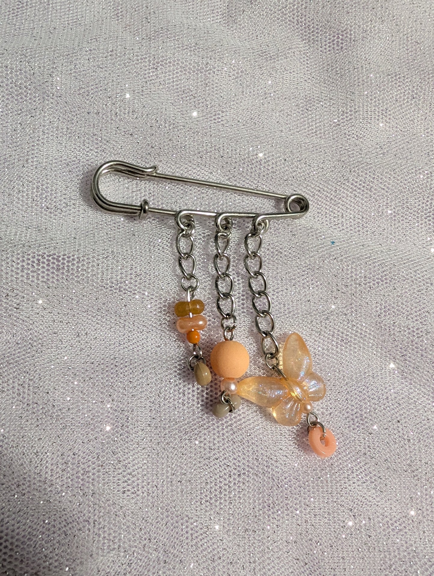 Broche Pixie