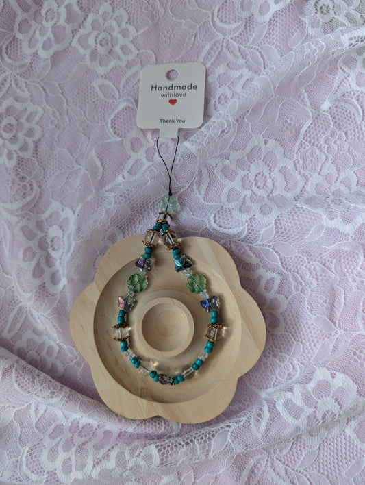 Charm de téléphone en verre