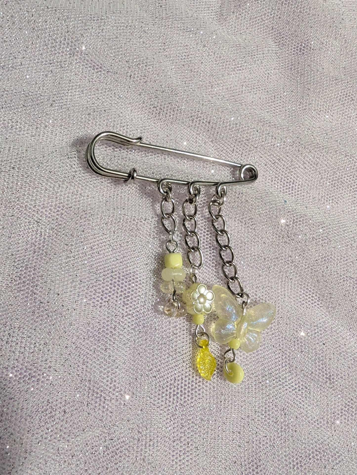 Broche Pixie