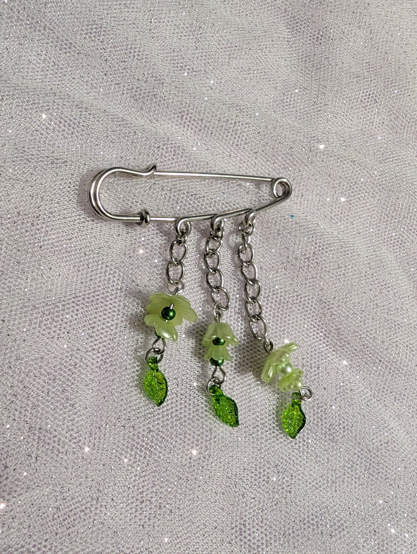 Broche Pixie