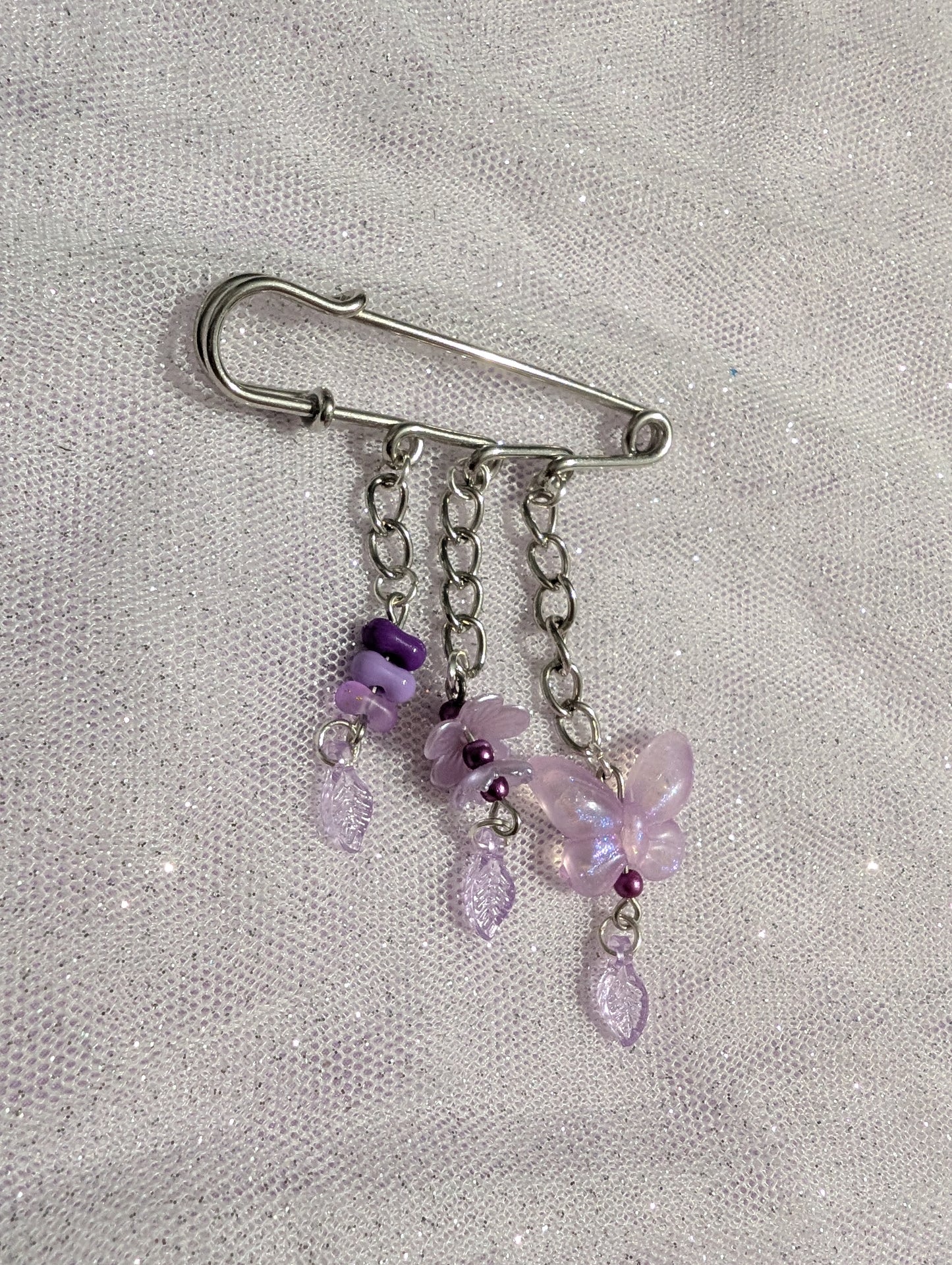Broche Pixie